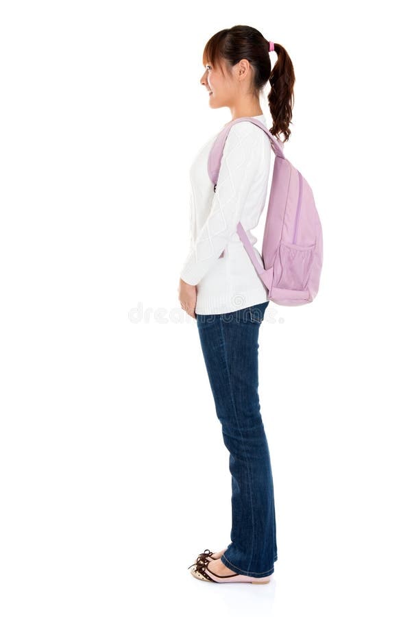 Student wearing a backpack correctly on both shoulders, sitting high on the back, in Burlington, ON.