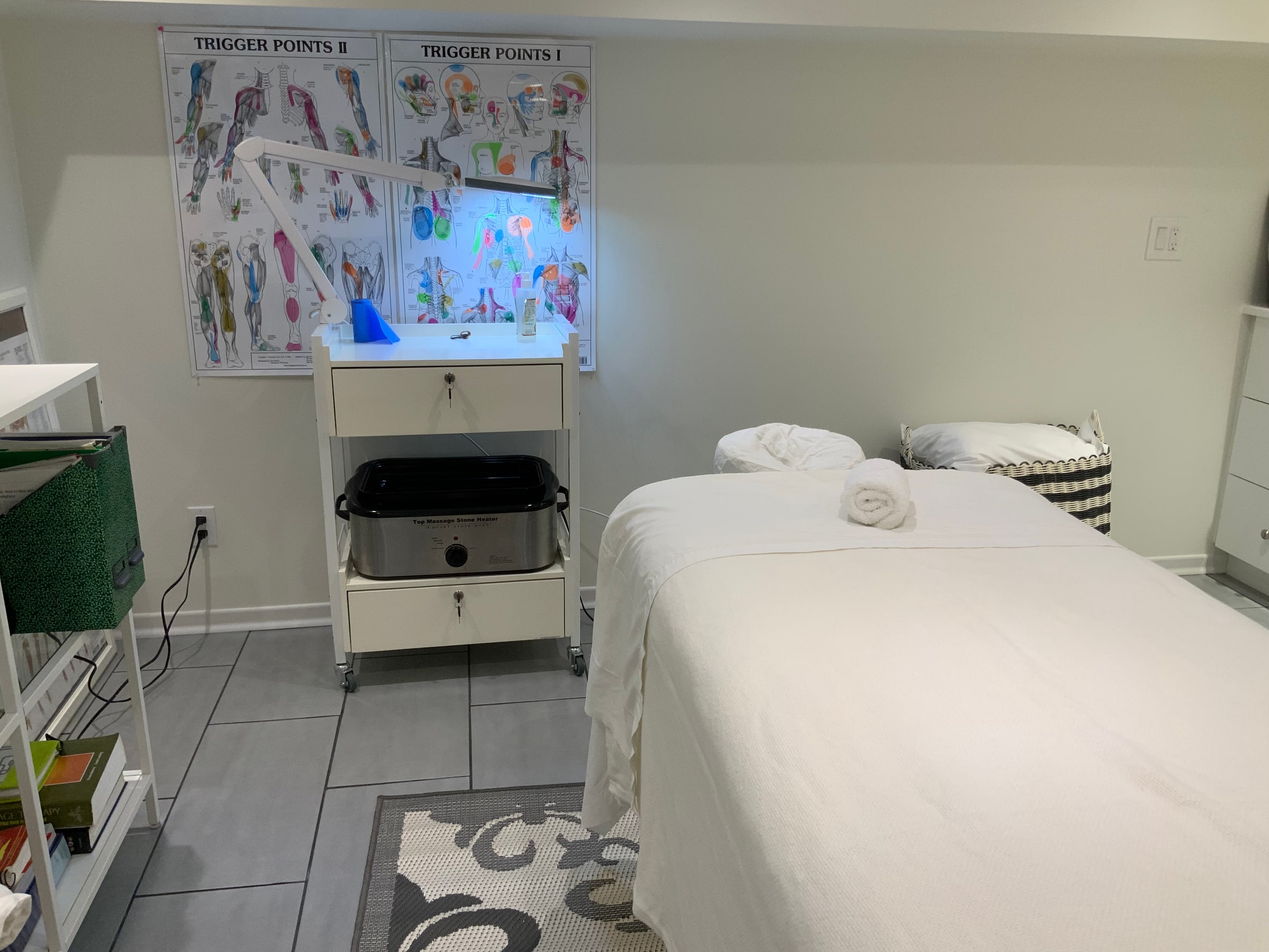 Massage table with fresh towels at Cypri Massage Therapy in Toronto